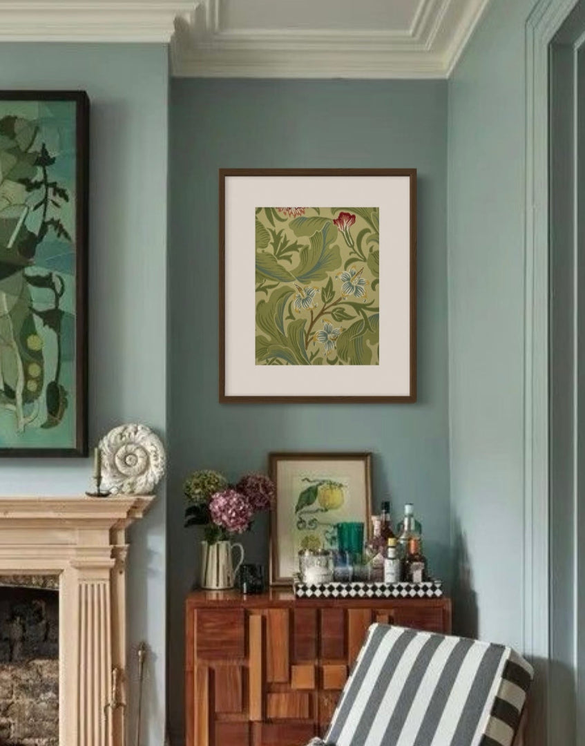 Classi heitage styled living room interior with blue walls, eclectic accessories and William Morris wall art