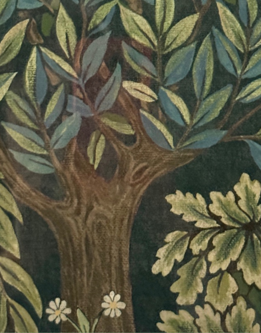 Close up detail of William Morris 'The Brook' vintage woodland wallpaper design