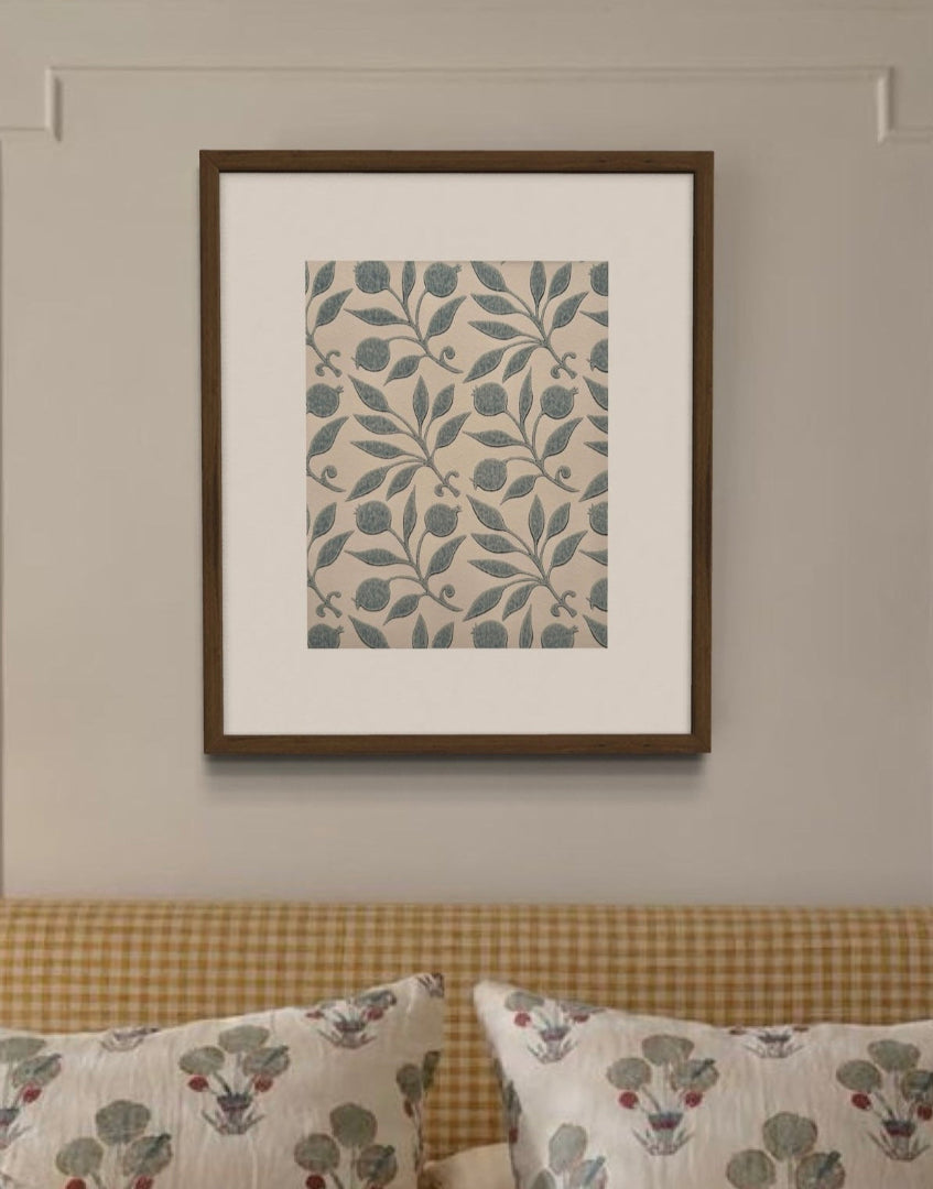 Yellow cottage style interior with William Morris framed print on wall