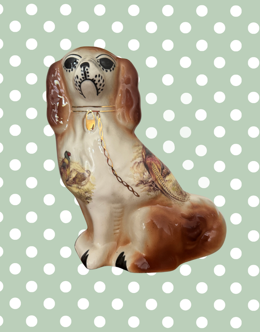 characterful countryside decorated ceramic staffordshire dog with gold chain detall
