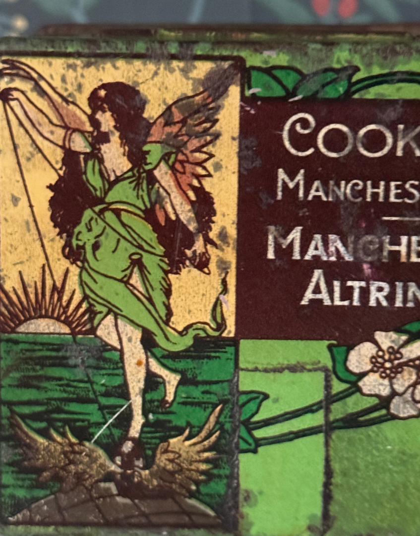 Close Up of Art Nouveau Textile Advertising Tin with Angel Motiff