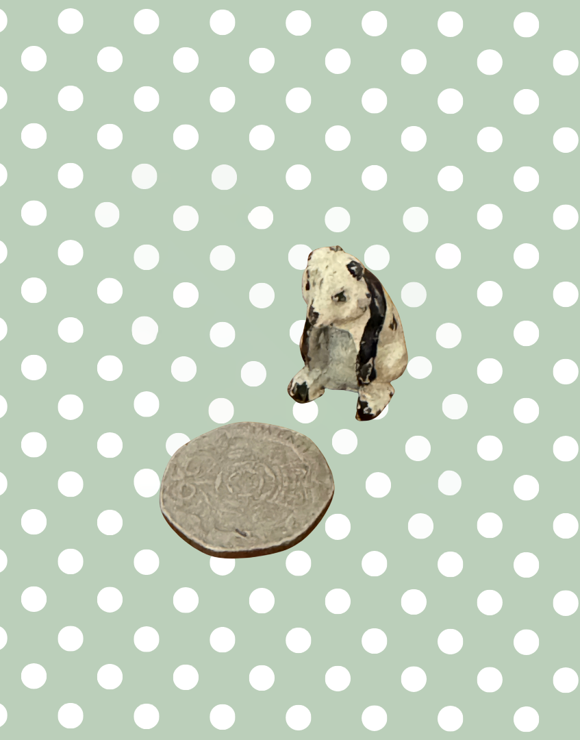 1940s Miniature Black & White Panda Figurine Next to Twenty Pence Coin for Scale