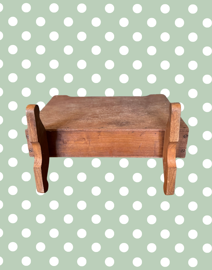 Underside view of wooden magazine rack