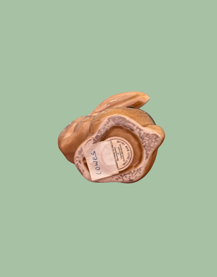 Base showing original cork of vintage sherry barware rabbit shaped bottle