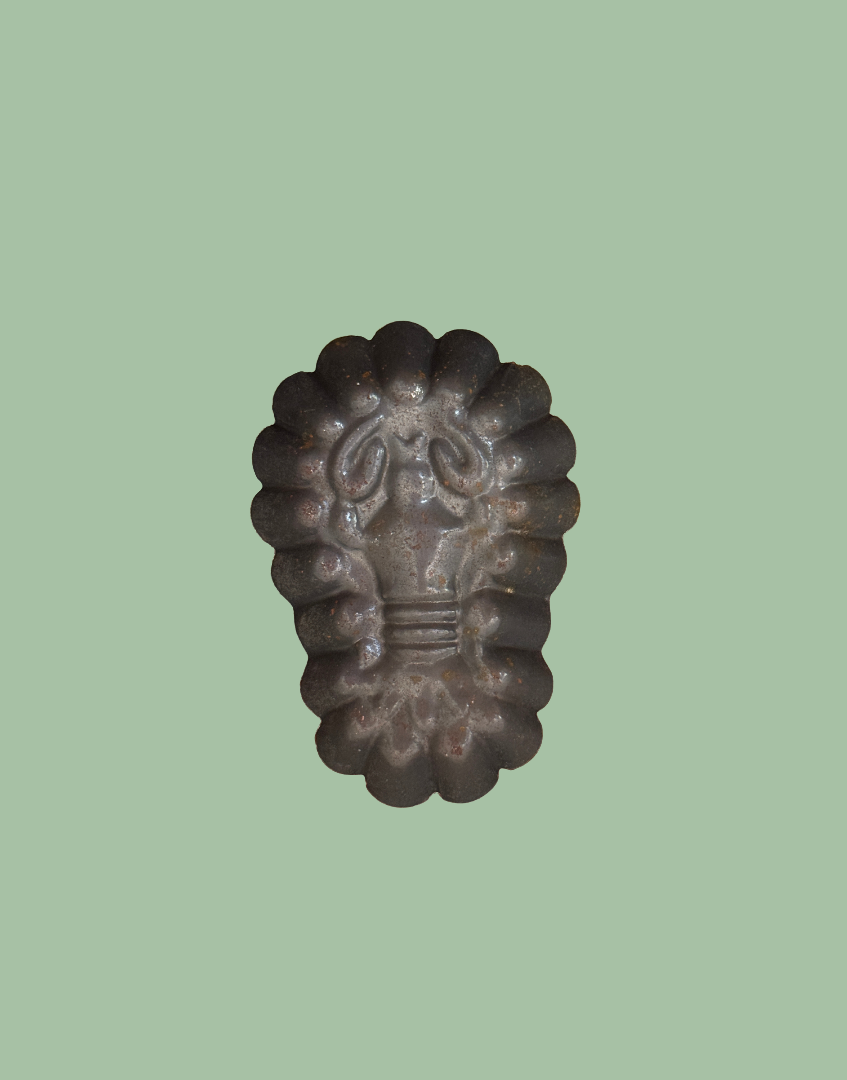 Reverse view of one vintage lobster shaped tinplate mould showing original metal construction and aged finish