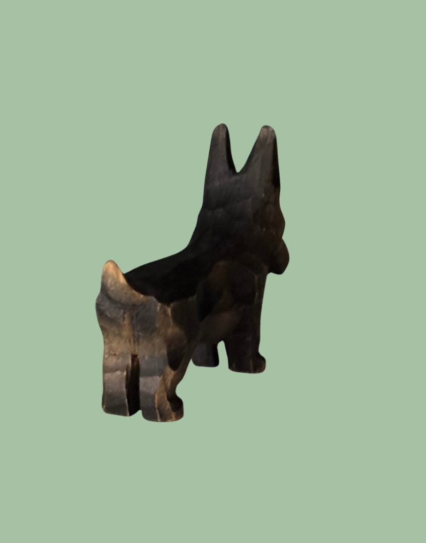 Rear view of antique carved wood collectable terrier dog
