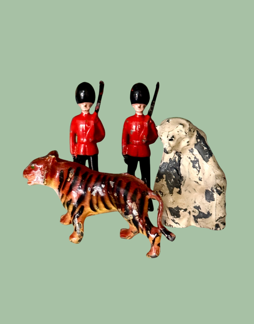 collectable britains lead toy figurines of a pair of grenadier soldiers, polar bear and tiger
