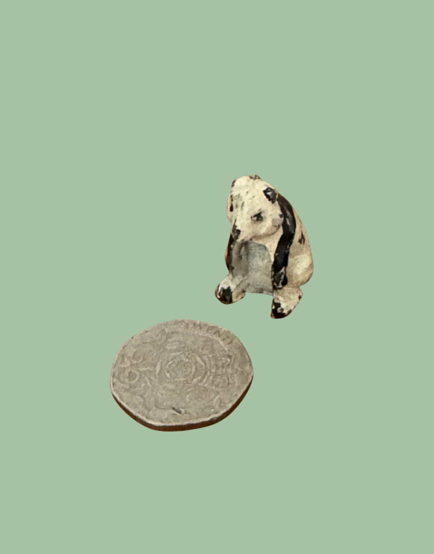 1940s Miniature Black & White Panda Figurine Next to Twenty Pence Coin for Scale