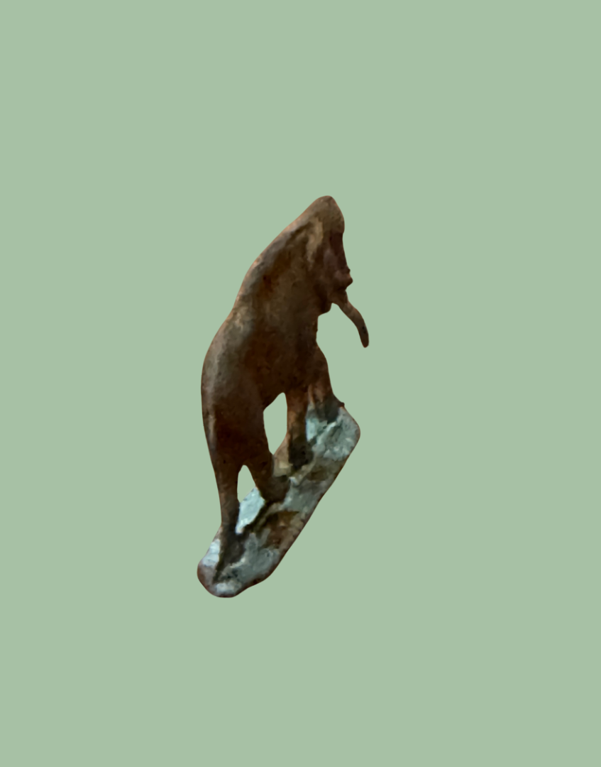 back view of vintage lead toy elphant ephemera