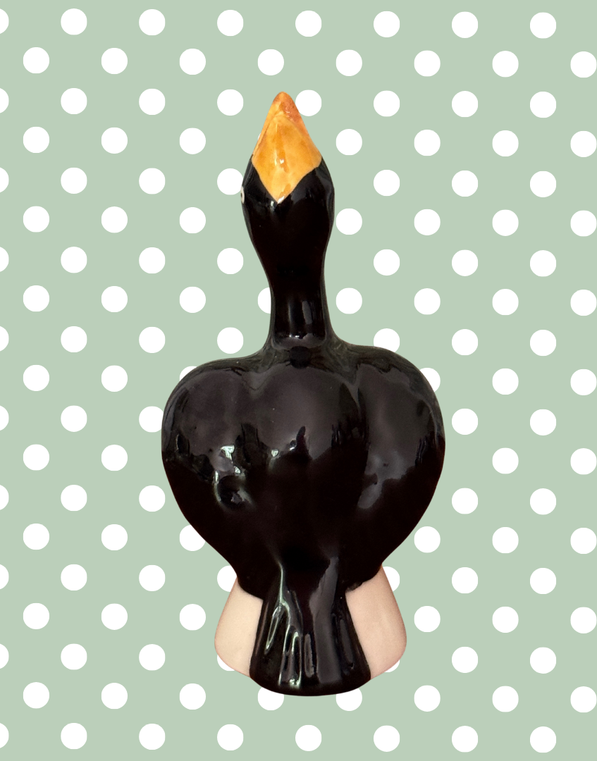 Reverse view of vintage pie bird collectable ceramic baking tool