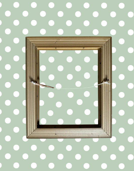 Reverse view of vintage gilt wooden picture frame showing open wooden frame construction without backing or glass
