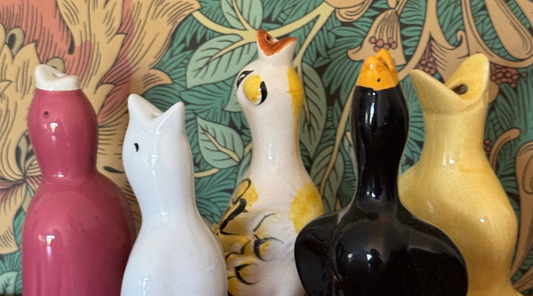 collection of colourful singing vintage ceramic pie birds