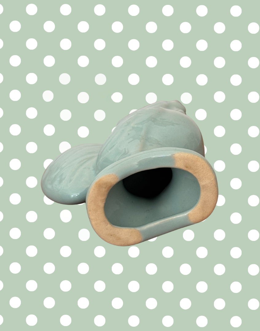 Under base of ceramic pie bird