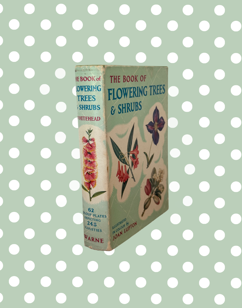 Angled view of The Book of Flowering Trees and Shrubs vintage gardening book