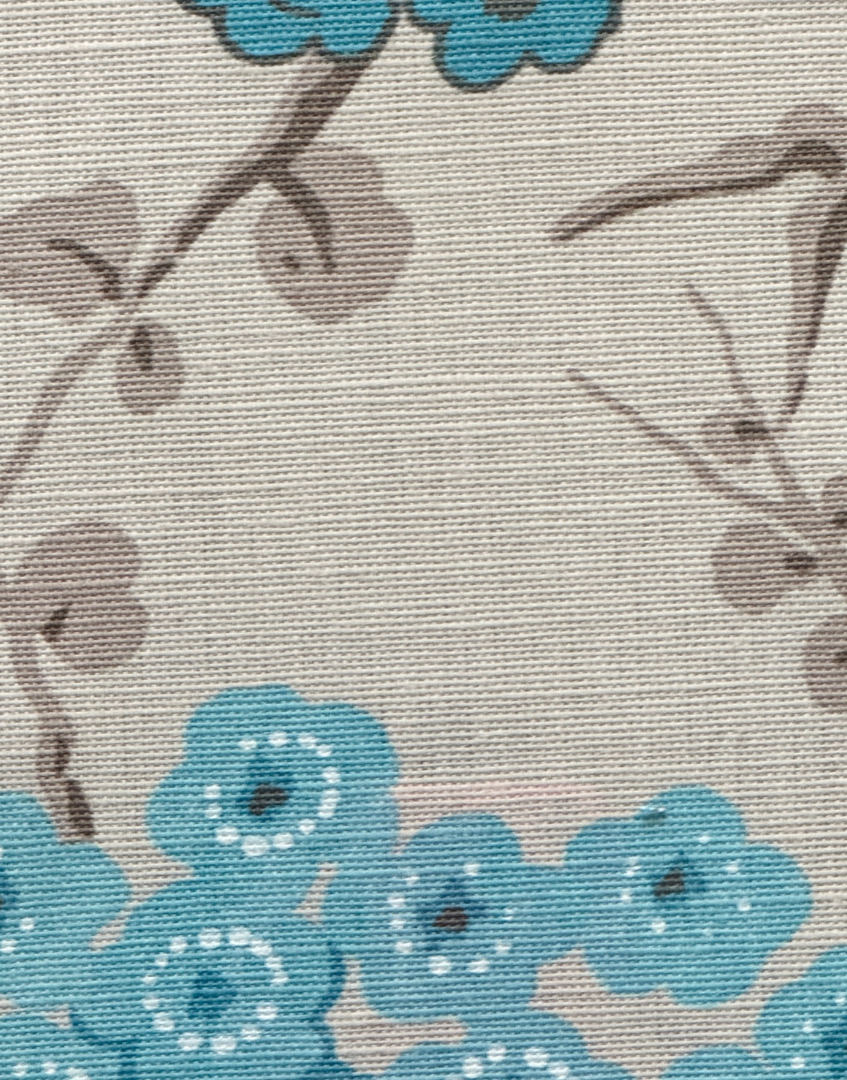 close up of pretty jaanese blue blossom textile art