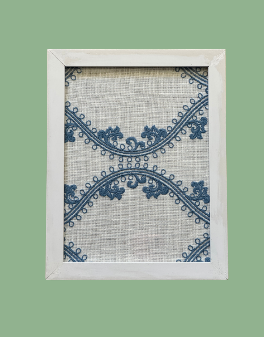 Pretty white and blue white wood framed textile wall art