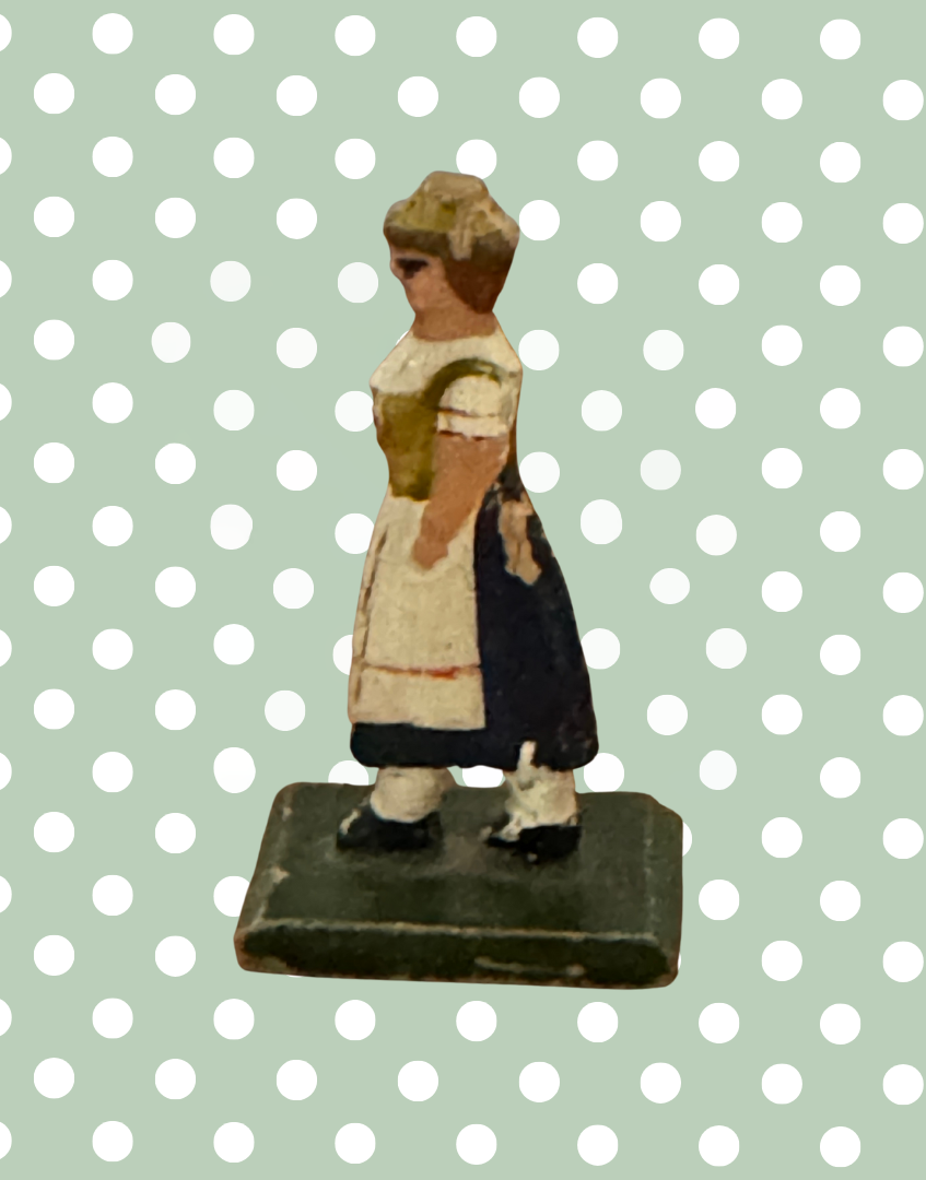 Product description:

A traditional flat wooden toy figure from the Erzgebirge region of Germany, featuring a hand-painted country farm woman. Lovely naive style and gentle signs of age make this a collectible piece of folk toy history.



Product details:

• Origin: Erzgebirge, Germany

• Material: Hand-painted wood

• 1930s



Condition:

Good vintage condition with light paint loss to back. Please refer to images.



Product dimensions:

Height: 5.5cm

Width: 1.5cm