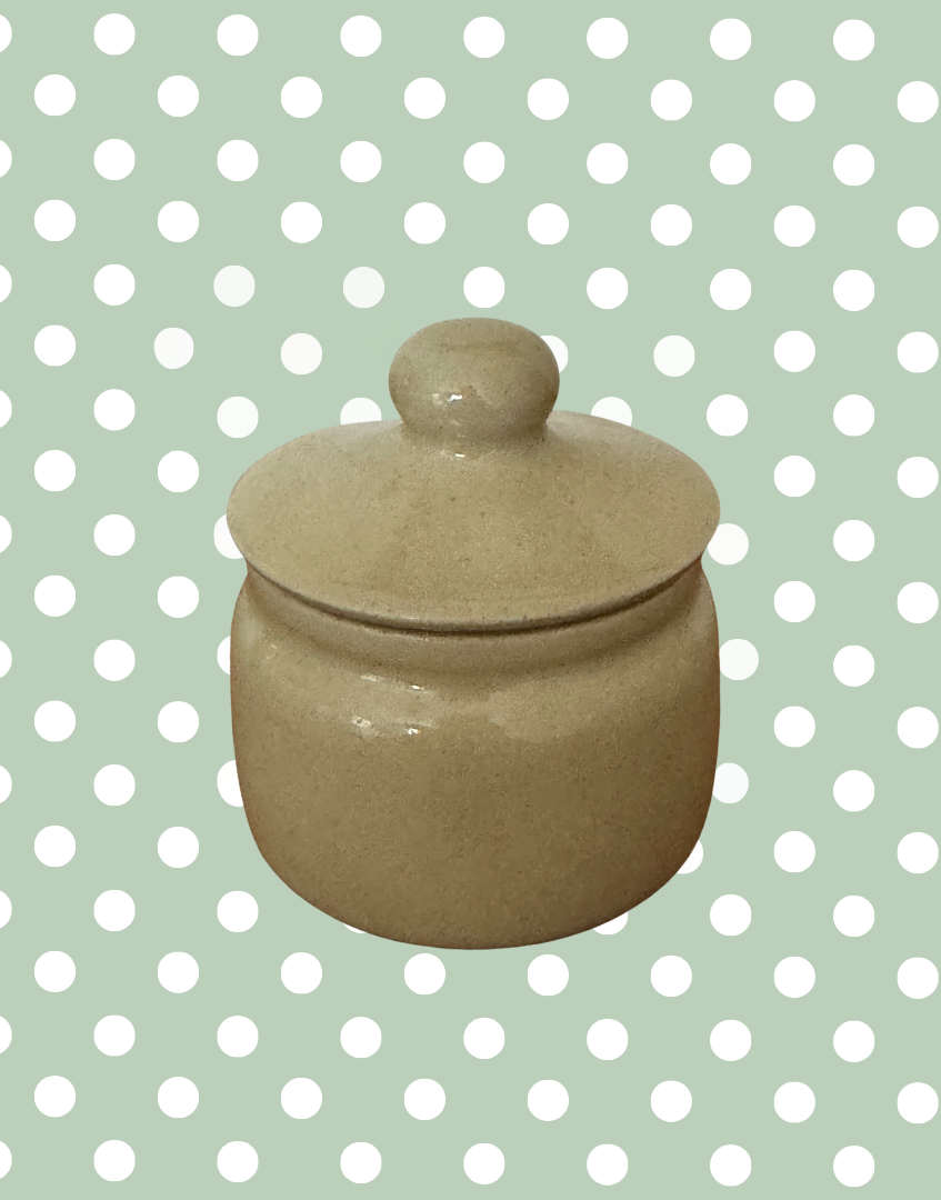 reverse view of vintage kitchenware collectable mustard pot