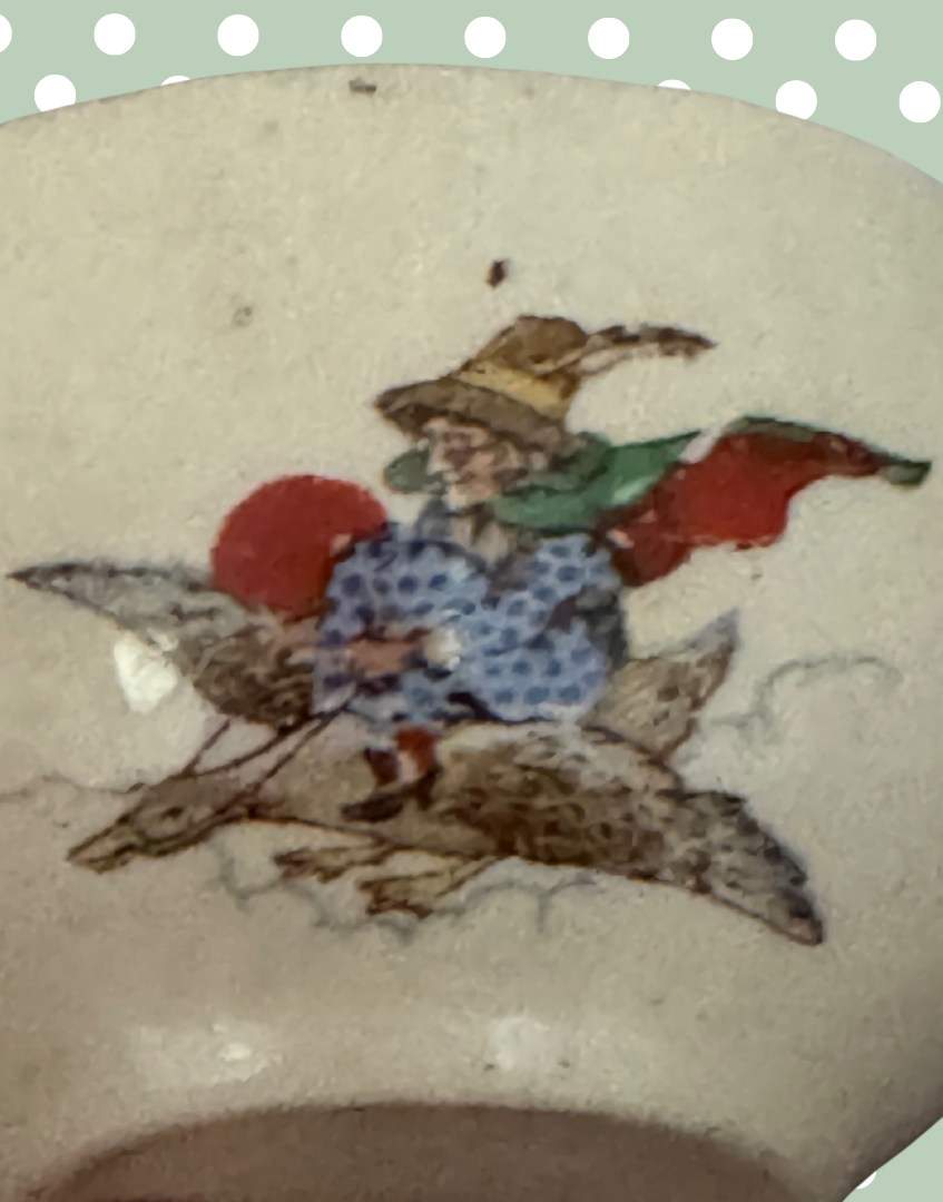 close up of mother goose nursery themed illustration on vintage childs playset sugar bowl