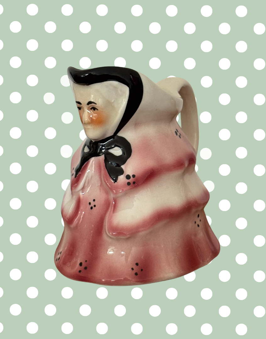 Side view of Tny Wood milk creamer