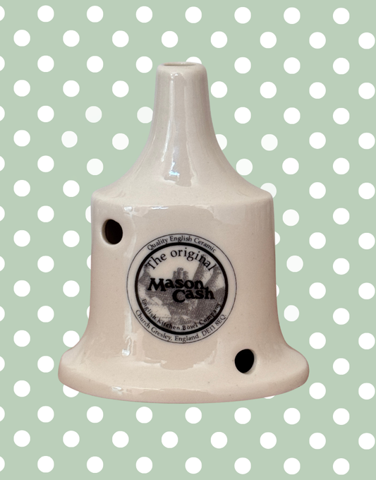 Ceramic British pie funnel with 'Mason Cash' branding 