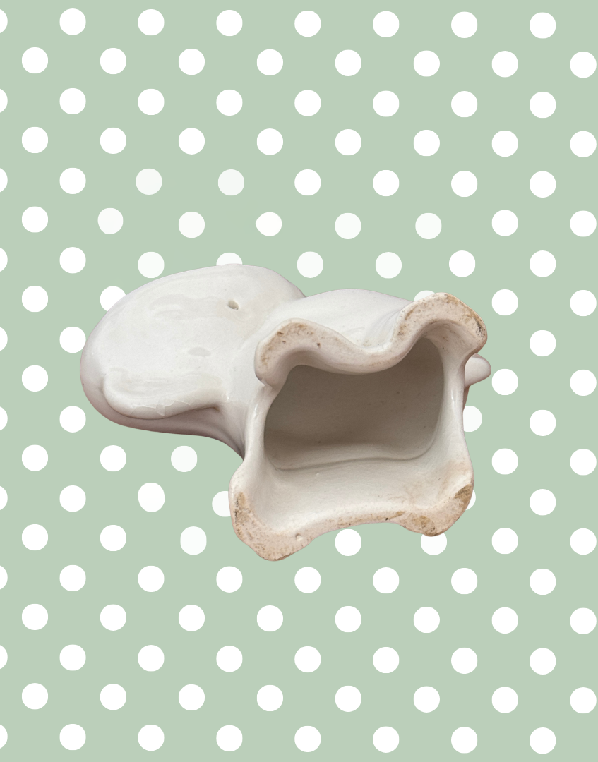 Interiors base view if white elephant shaped baking collectable