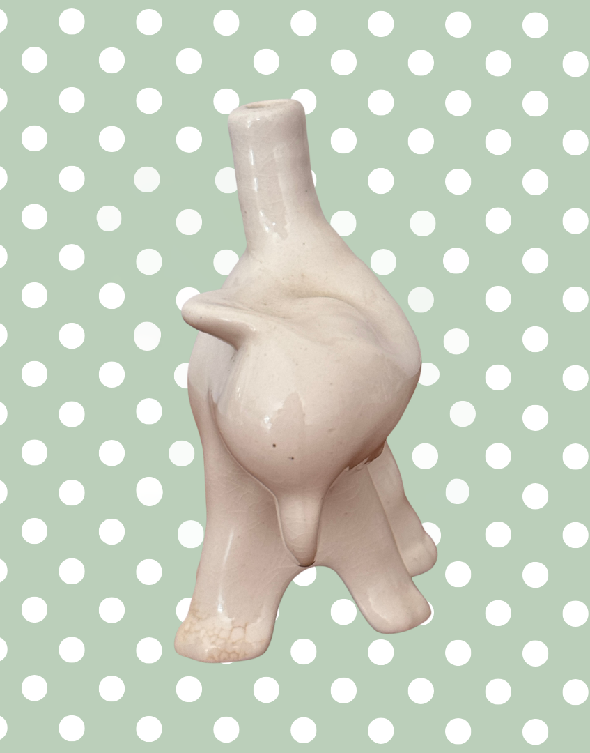 front view of white ceramic elephant baking tool