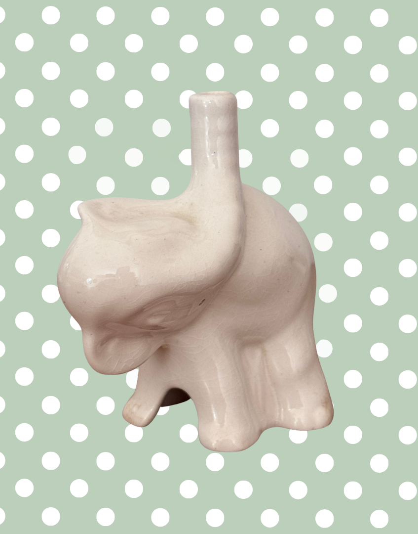 white ceramic elephant shaped vinatge baking tool