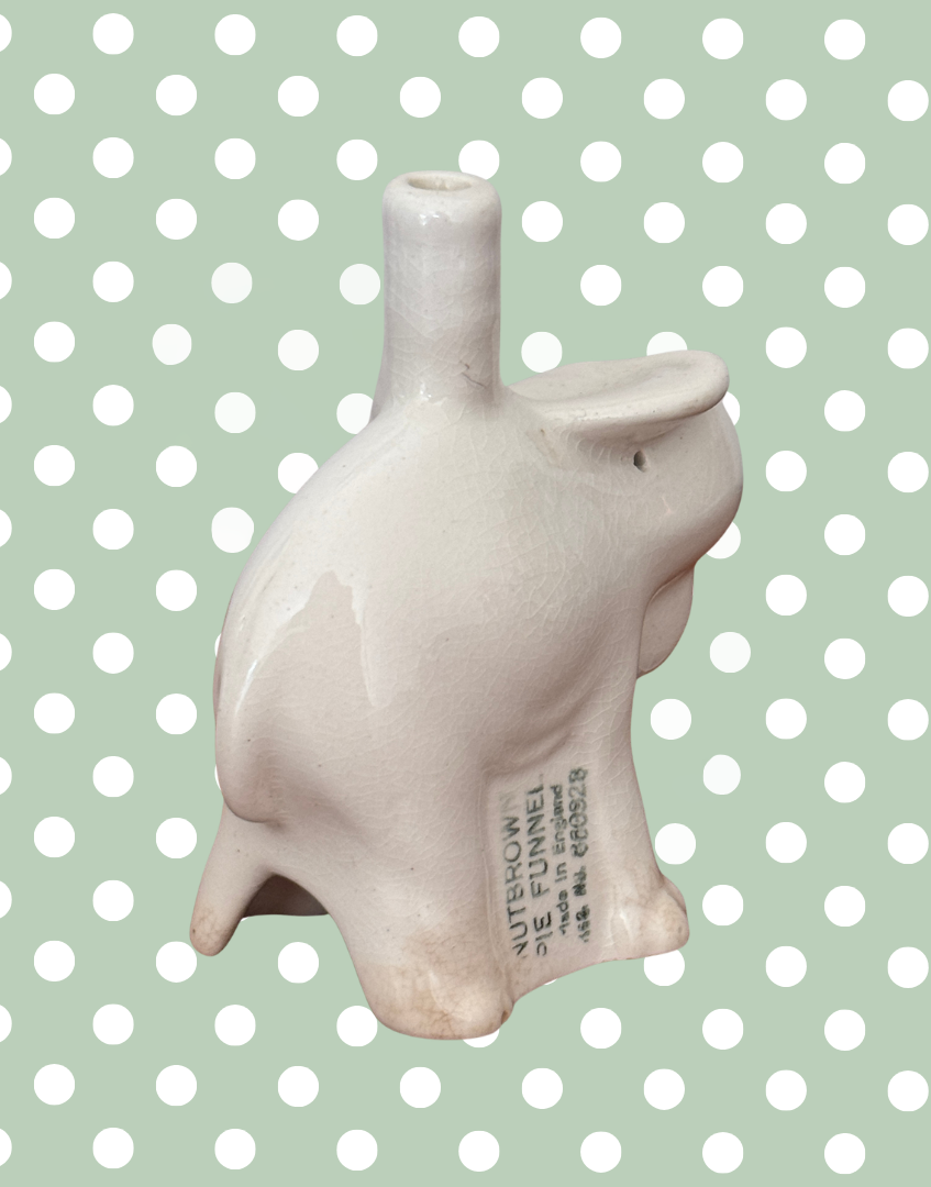 nutbrown pottery stamp in side of elephant pie vent