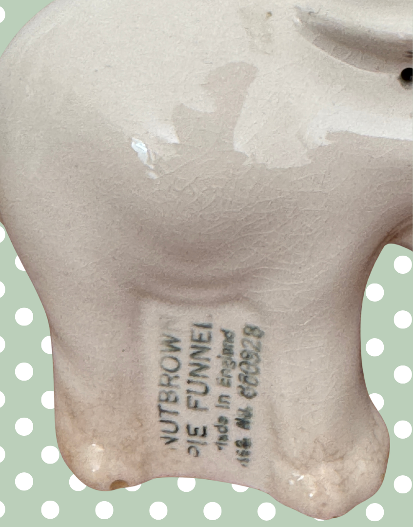 close up of nutbrown funnel amde in england stamp on elephant kitchen collectable