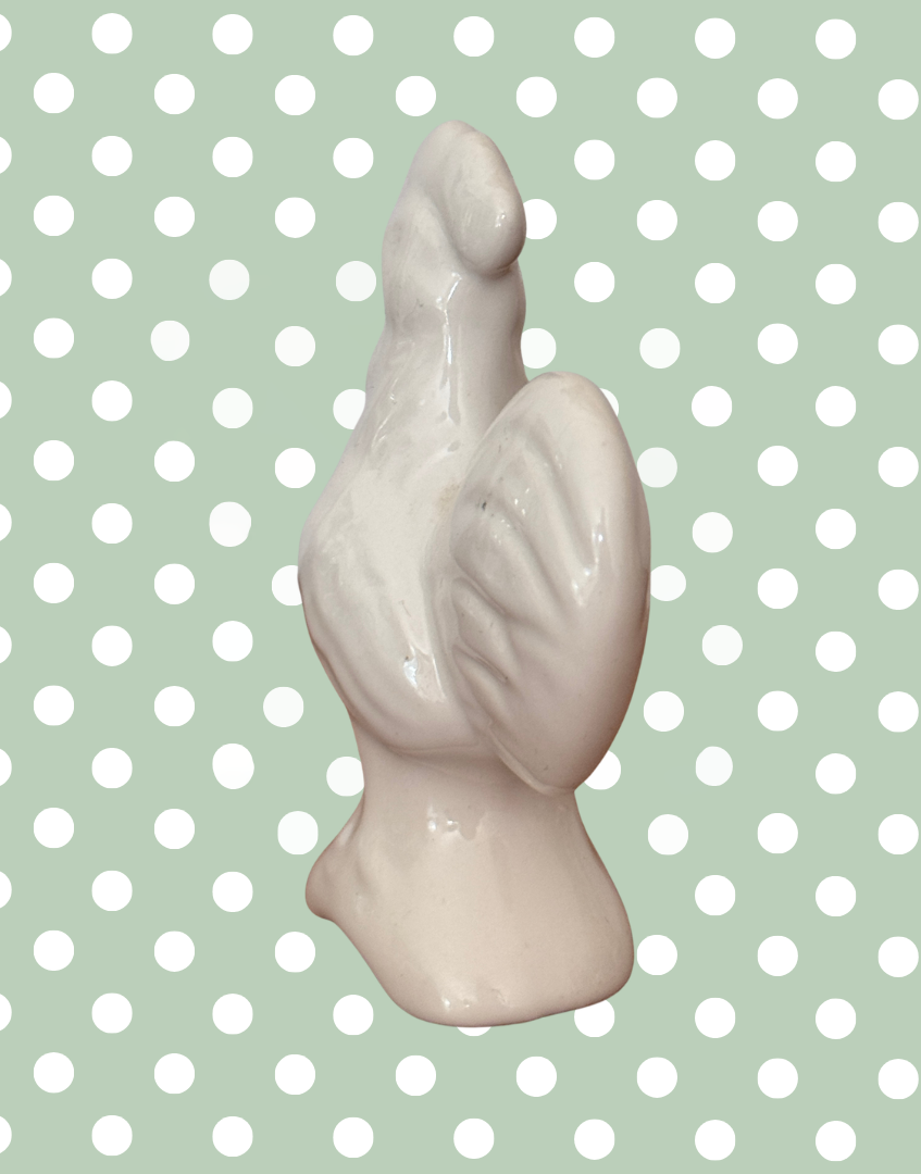 Back view of white ceramic chicken pie funnel