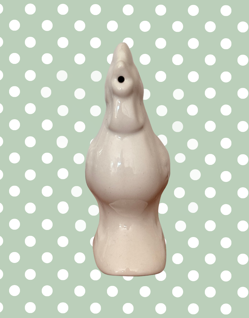 Front view of steam hole in beak of collectable pie bird