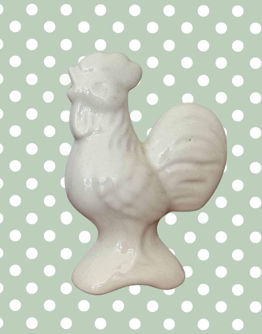 side view of white ceramic pie bird
