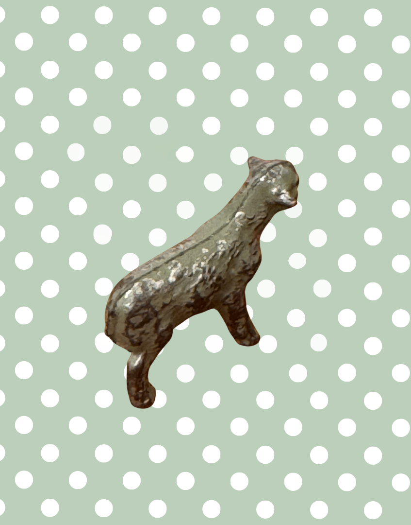 back view of vintage lead lamb farm collectable