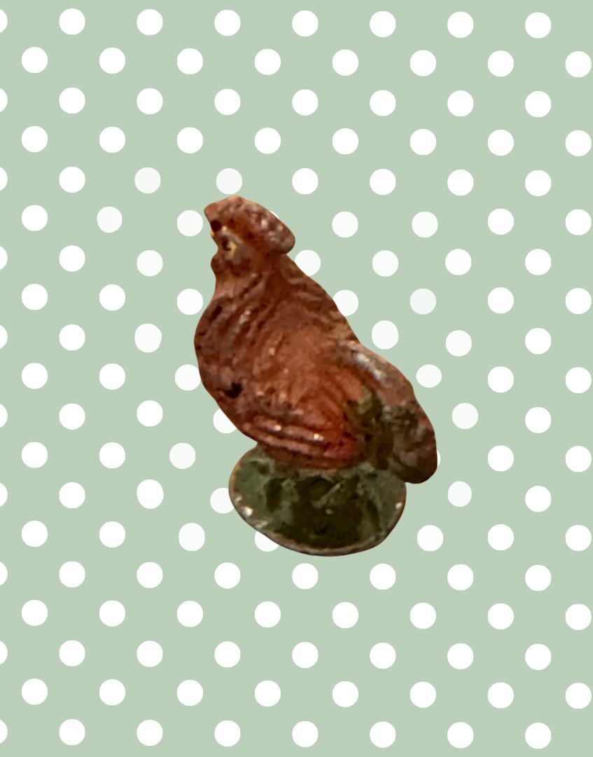 reverse view of brown cockerel britains vintage lead toy