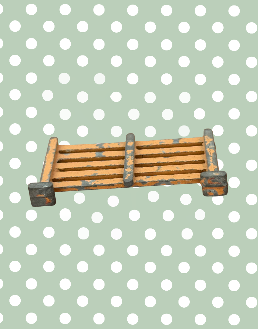 undersie view of britains farm lead painted gate toy