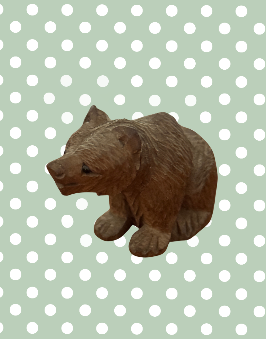 Antique Black Forest bear seated figure in light wood finish