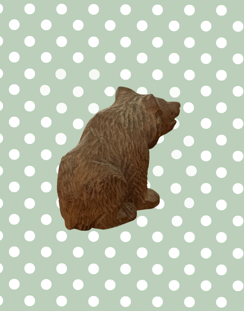 Back view of collectible German folk art wooden bear miniature sculpture