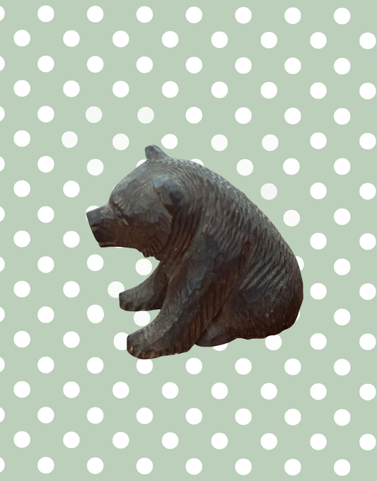 Vintage dark wood carved bear with rustic aged finish