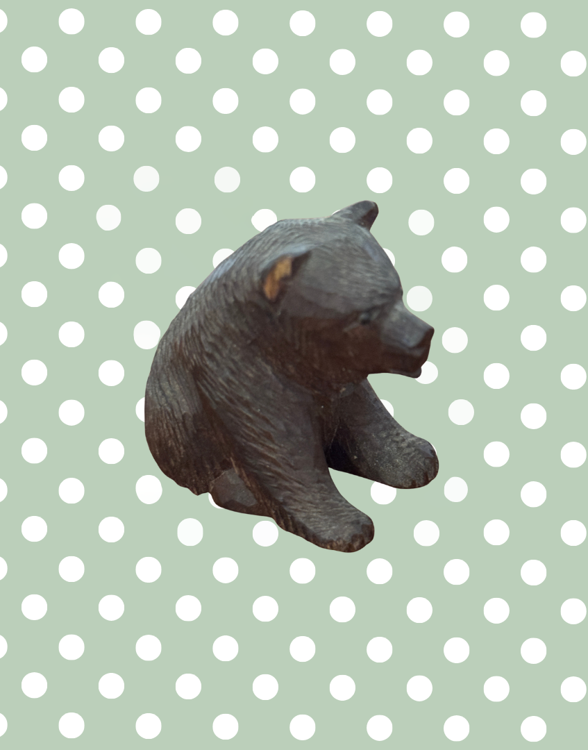 Antique German wooden bear figurine side view showing ear chip  detail