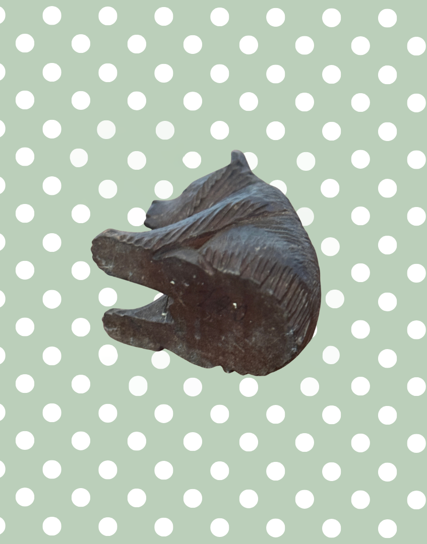 Small Black Forest bear carving base view underside worn wood