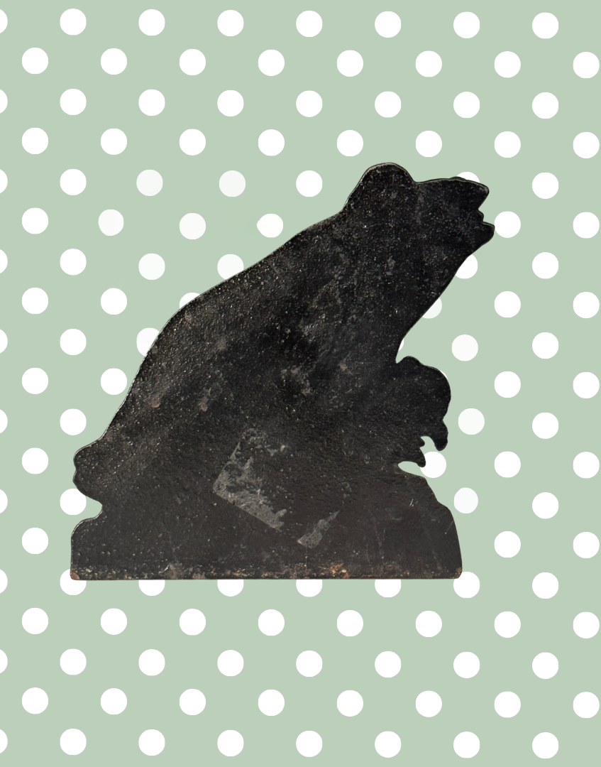 Back of characterful vintage cast iron frog doorstep front facing ornament
