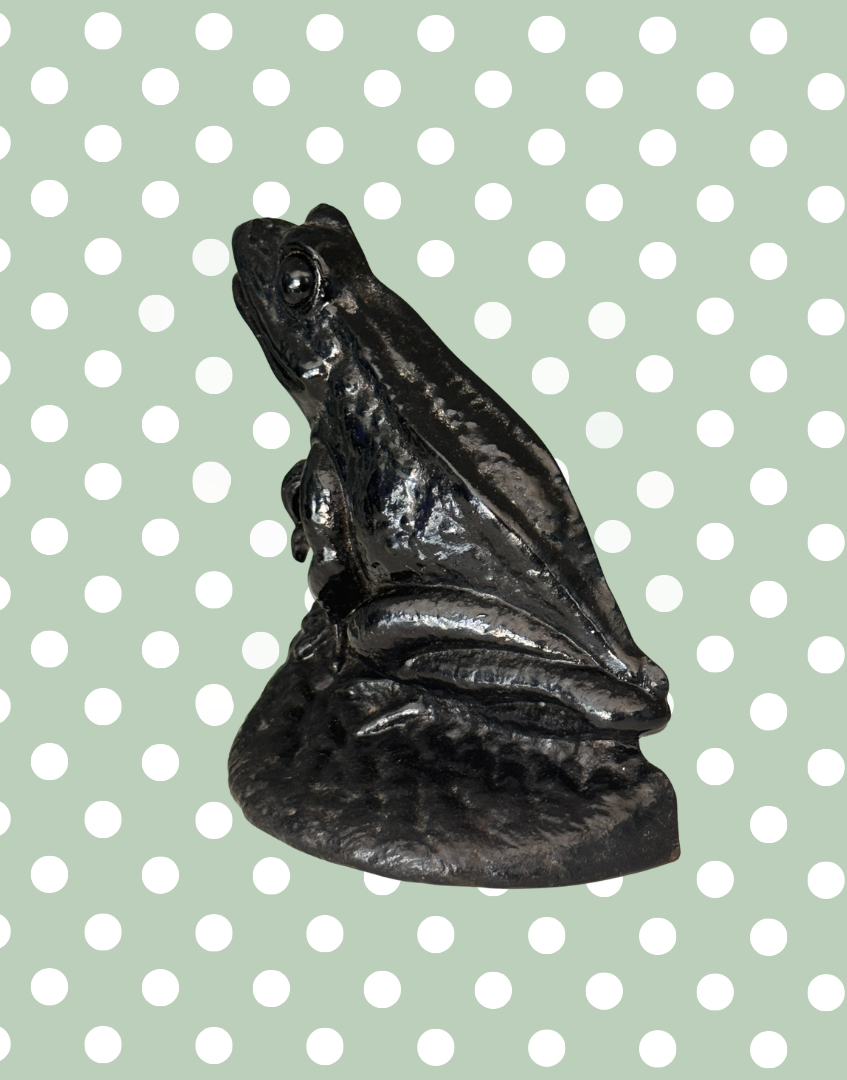 Black vintage frog doorstop side view heavy cast iron homeware piece