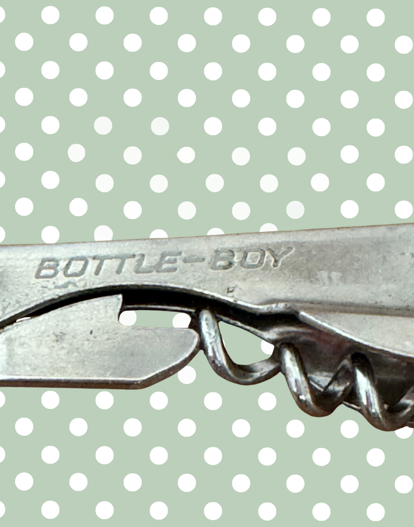 Stainless steel bottle opener with 'Bottle Boy' branding