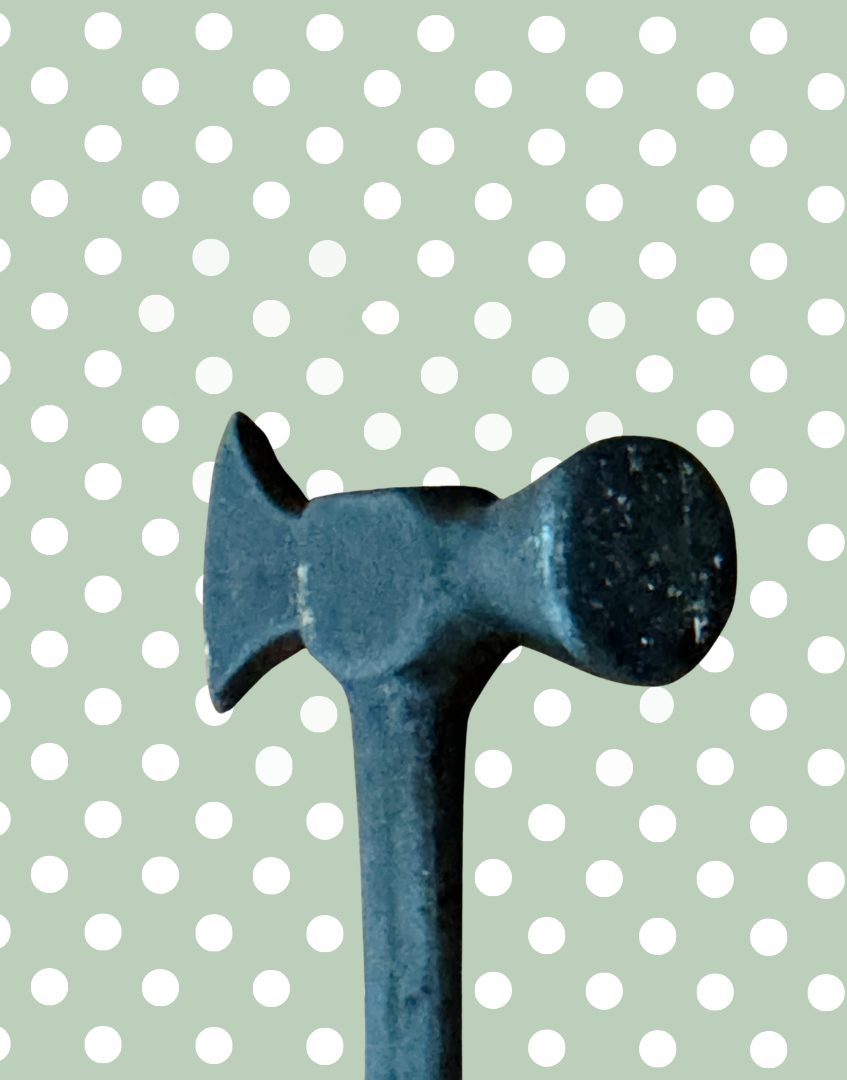 Patina detail vintage cast iron toffee hammer
