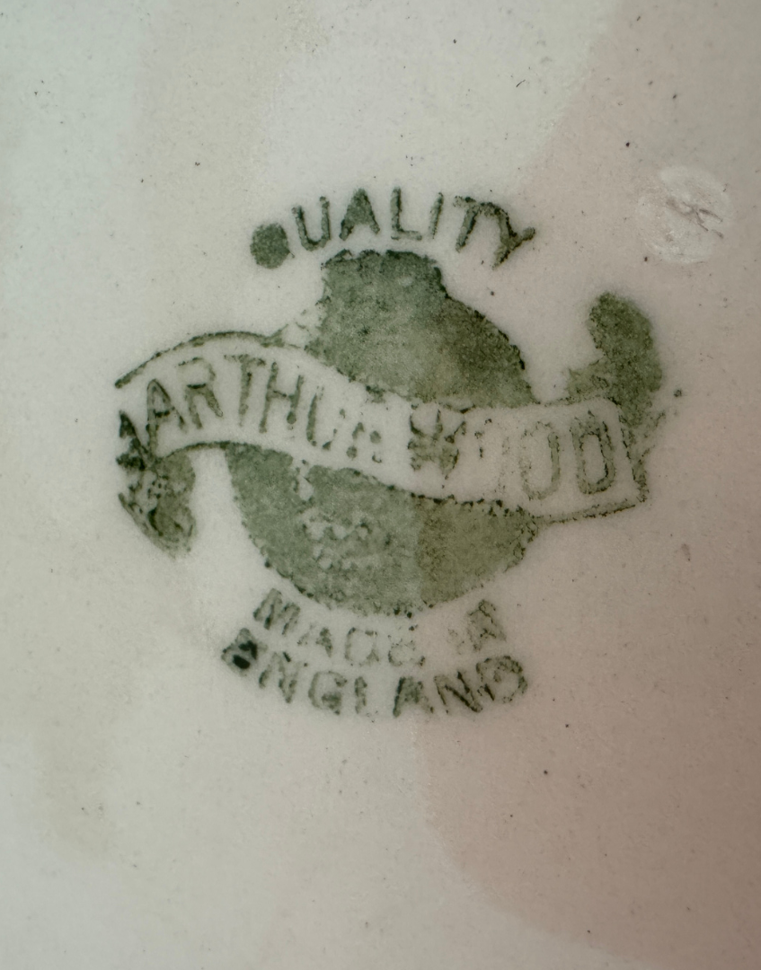 Green makers stamp on a white background with 'Arthur Wood' branding