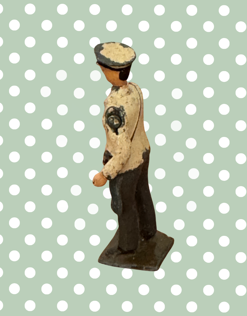 Side view of Britains farm figure articulated arm