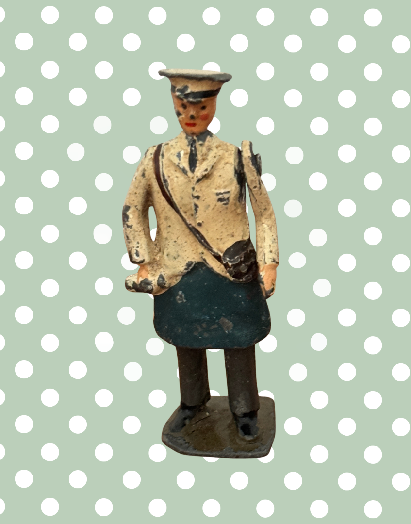 Britains milkman toy with moving arm detail close up