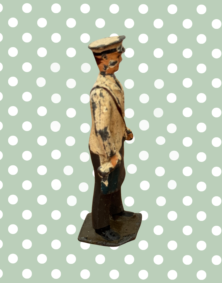 Side view of Britains farm figure milkman holding milk bottle