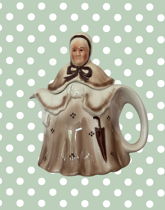 Vintage brown Tony Wood Staffordshire pottery Little Old Lady teapot with umbrella handle and bonnet detail front view